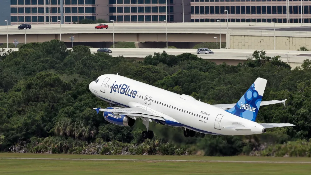 Emergency exit incident sparks security concerns on JetBlue flight post image